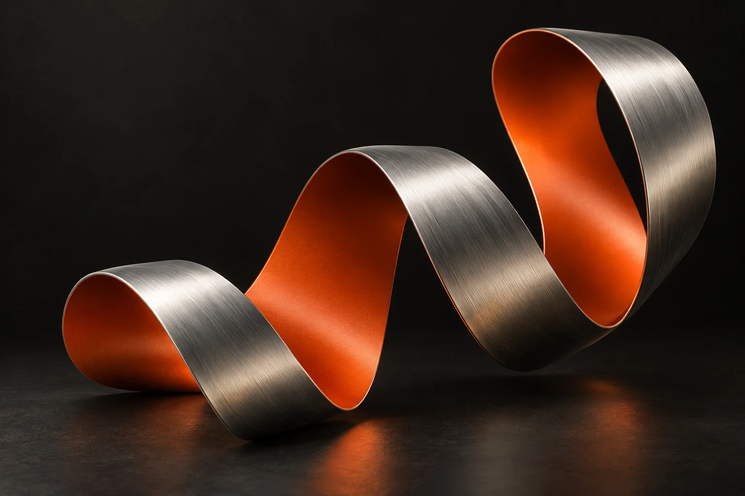 A continuous sculptural ribbon of brushed aluminum and orange enamel